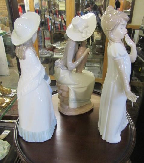 NAO YAWNING GIRL FIGURE AND TWO OTHERS Image