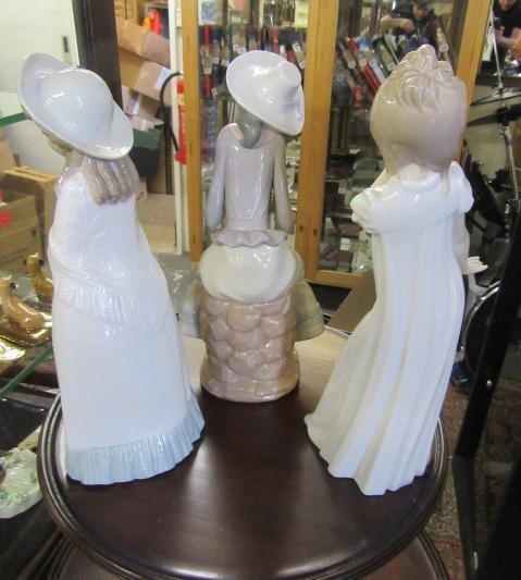 NAO YAWNING GIRL FIGURE AND TWO OTHERS Image