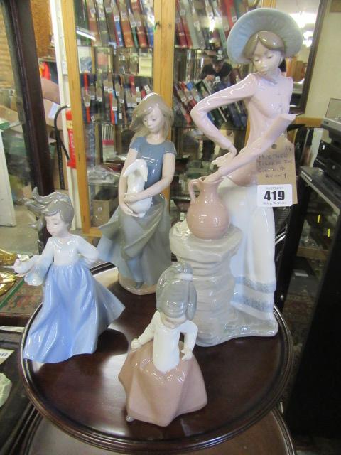 NAO FIGURE GIRL WITH RABBIT AND THREE OTHERS Image