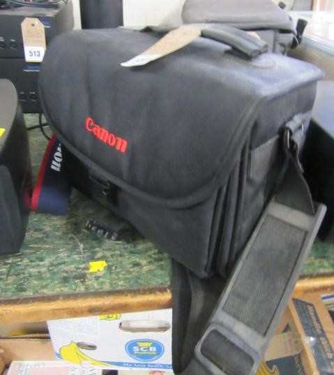 CASED CANON EOS 500 CAMERA AND A LENS  Image