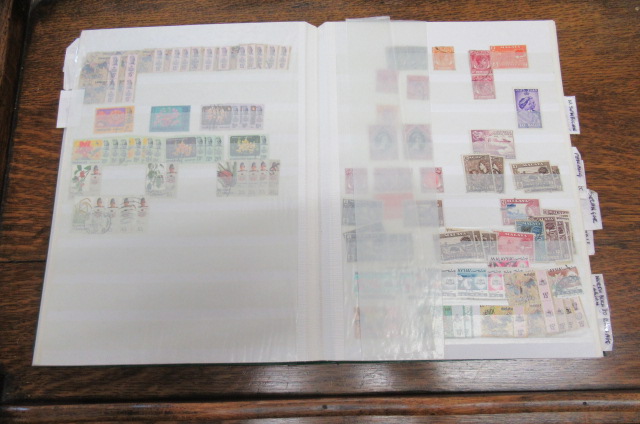 WELL STOCKED MALAYSIAN STATES STAMP ALBUM Image