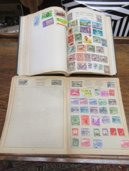 TWO ALBUMS OF WORLD STAMPS Image