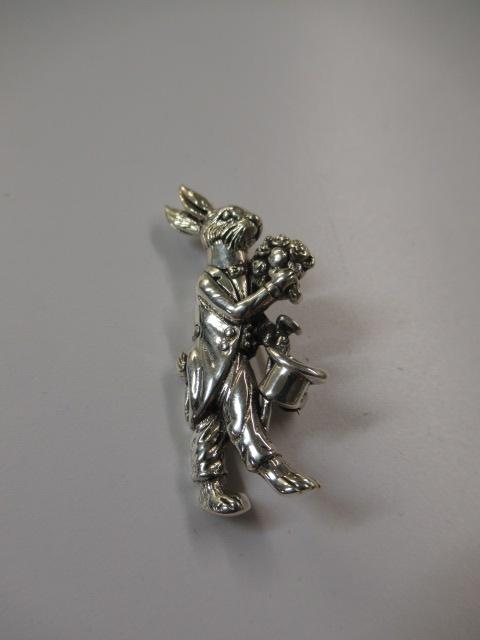 SILVER RABBIT WITH FLOWERS BROOCH Image
