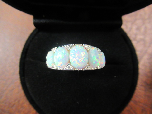SILVER AND OPAL SET RING Image