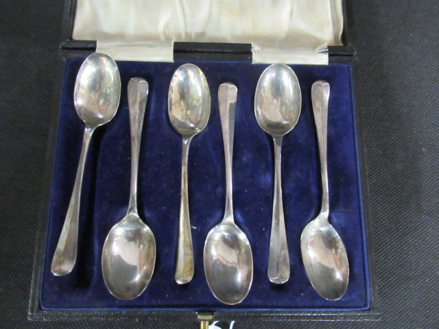 CASE OF SILVER TEASPOONS Image