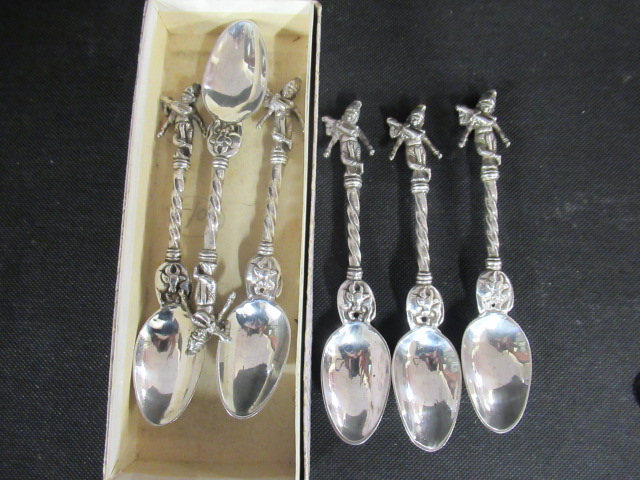 WHITE METAL ORIENTAL SPOONS Image