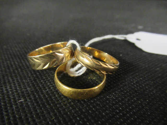 TWO 9CT GOLD RINGS AND ANOTHER Image