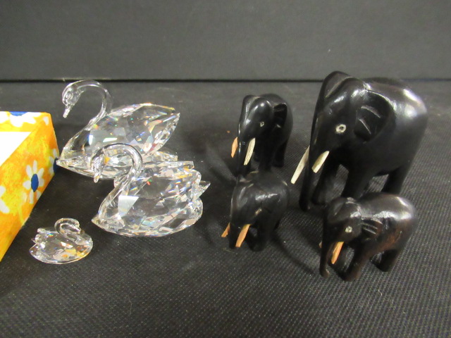THREE SWAROVSKI ITEMS AND FOUR ELEPHANTS  Image