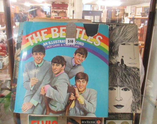 SEVEN VARIOUS BEATLES LP RECORDS INCLUDING SGT PEPPERS LONELY HEARTS AND AN ILLUSTRATED BEATLES BOOK Image