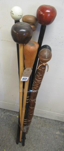 EIGHT WALKING STICKS Image