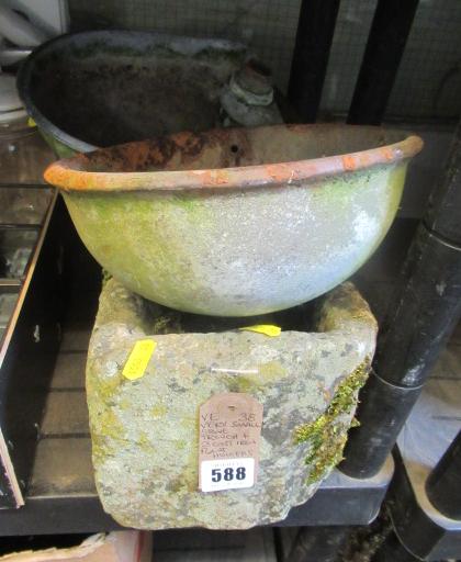 SMALL STONE TROUGH AND THREE CAST IRON PLANT HOLDERS Image