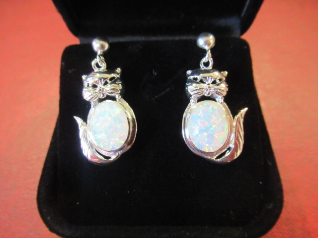 PAIR OF OPAL SET SILVER CAT EARRINGS Image