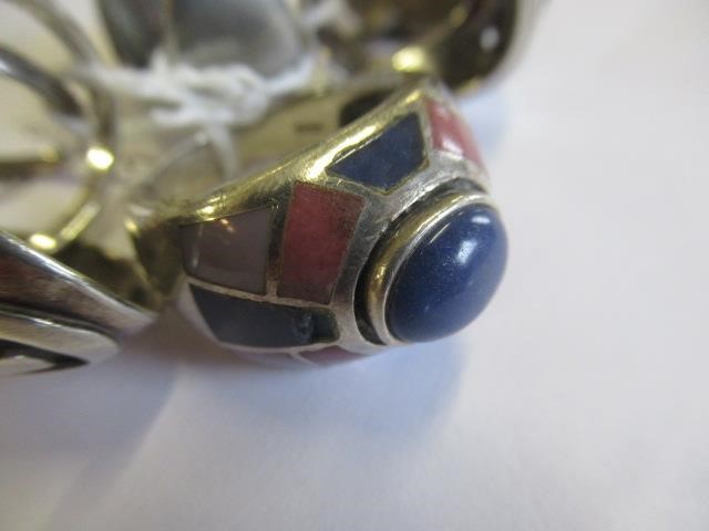 THREE SILVER RINGS AND THREE OTHERS Image