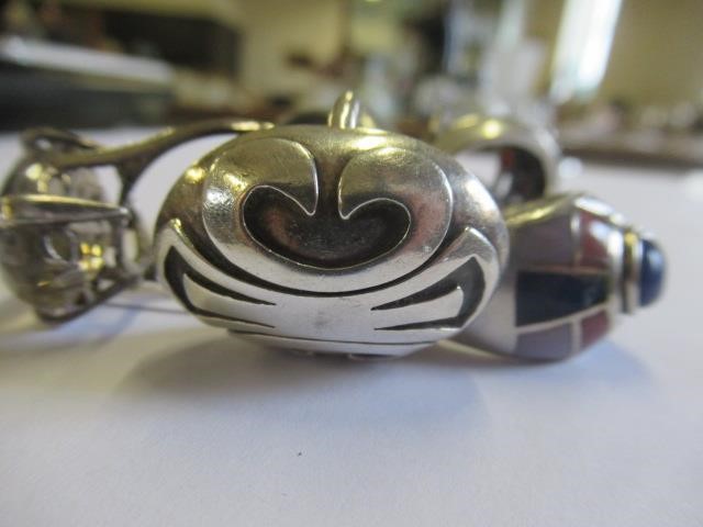 THREE SILVER RINGS AND THREE OTHERS Image