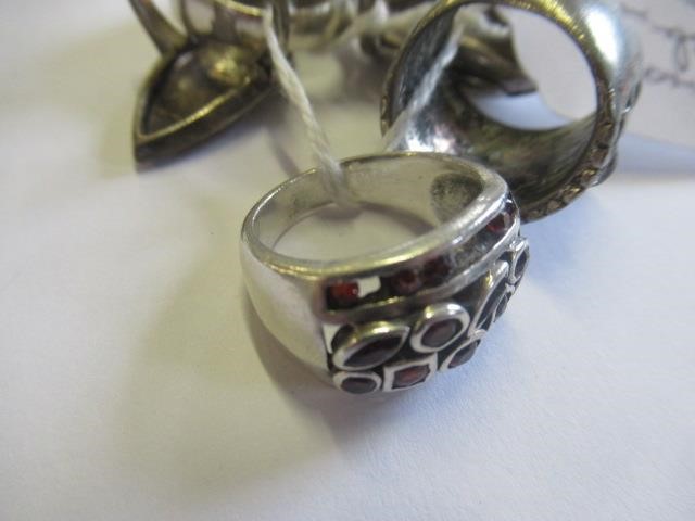 THREE SILVER RINGS AND THREE OTHERS Image