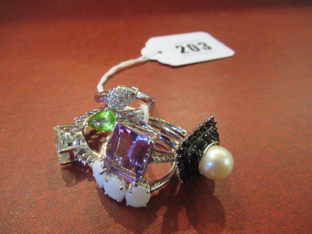 FIVE STONE SET SILVER RINGS Image