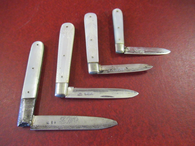 FOUR SILVER AND MOTHER OF PEARL FRUIT KNIVES Image