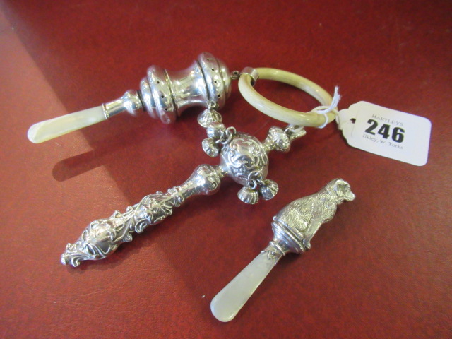 THREE SILVER RATTLES Image