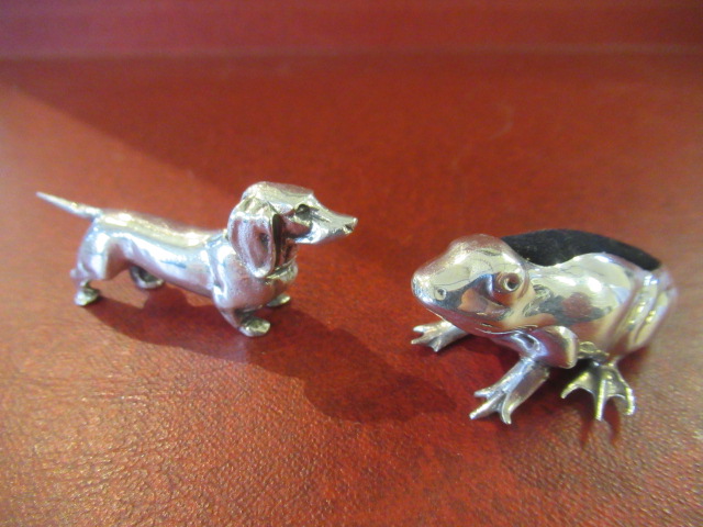 SILVER FROG PIN CUSHION AND A CONTINENTAL DACHSHUND MODEL Image