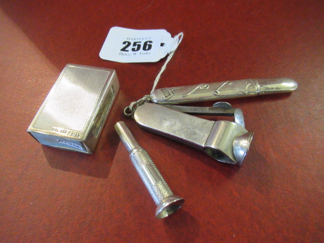 TWO SILVER CIGAR PIERCERS, MATCHBOX COVER AND SMOKERS PENCIL Image