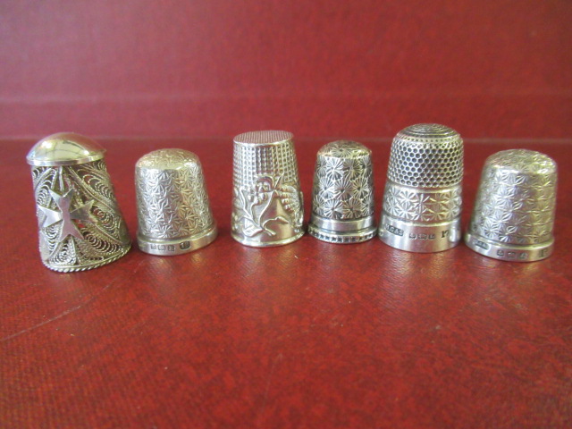 SIX SILVER THIMBLES Image