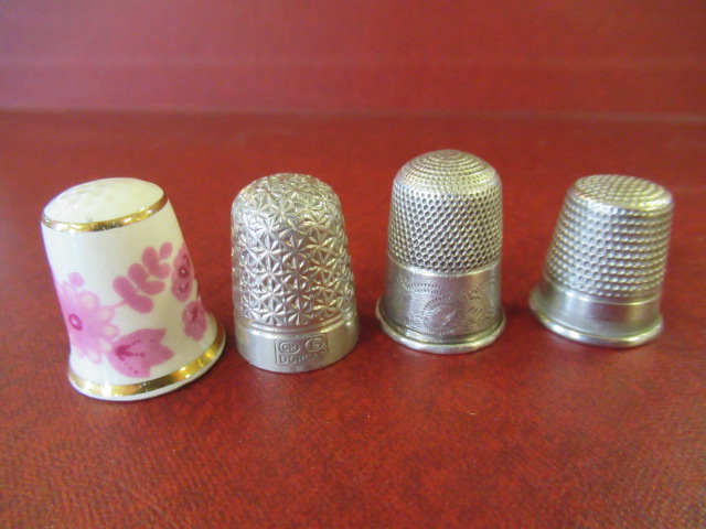 FOUR THIMBLES Image