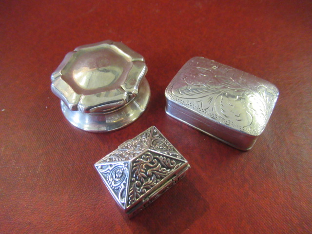 THREE SILVER BOXES Image