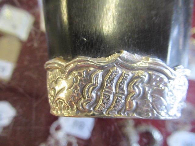 THREE SILVER TOPPED BOTTLES WITH ENAMEL ETC Image