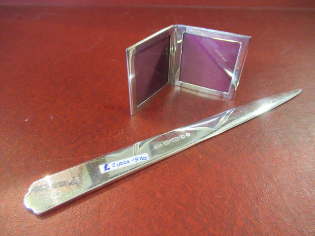 SILVER LETTER OPENER AND MINIATURE FOLDING PHOTO FRAME Image
