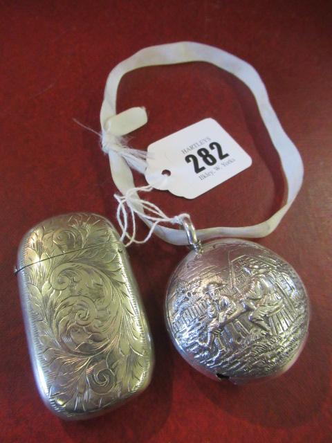 SILVER VESTA CASE AND A CONTINENTAL METAL RATTLE Image