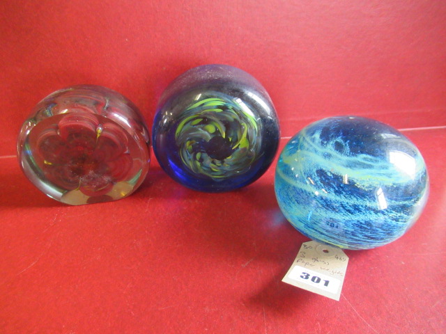 THREE GLASS PAPERWEIGHTS Image