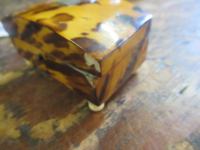 THREE GEORGIAN TORTOISESHELL TRINKET BOXES Image