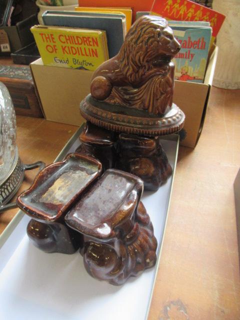 FOUR VICTORIAN TREACLE GLAZED FEET AND A LION Image