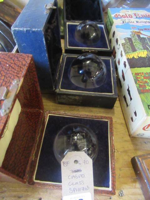 THREE CASED GLASS SPHERES Image