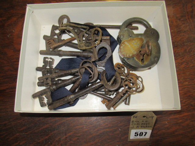 BOX OF OLD KEYS AND A PADLOCK Image