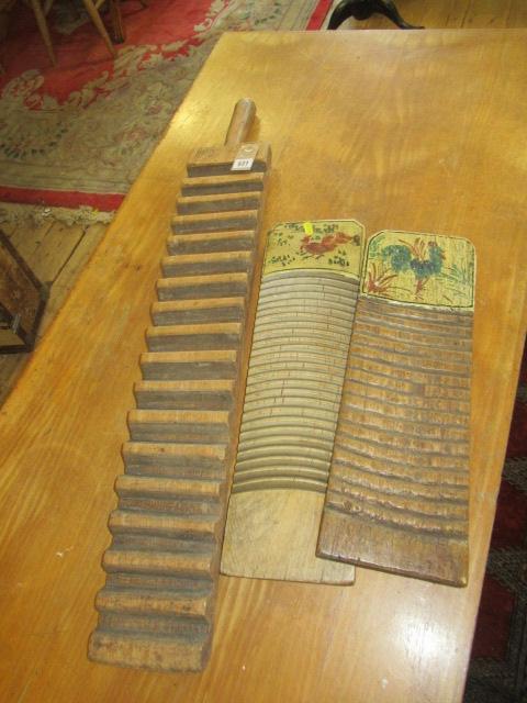 TWO CIGAR  MOULDS AND A WASH BOARD Image