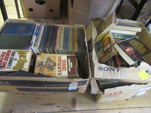 FOUR BOXES OF BOOKS Image