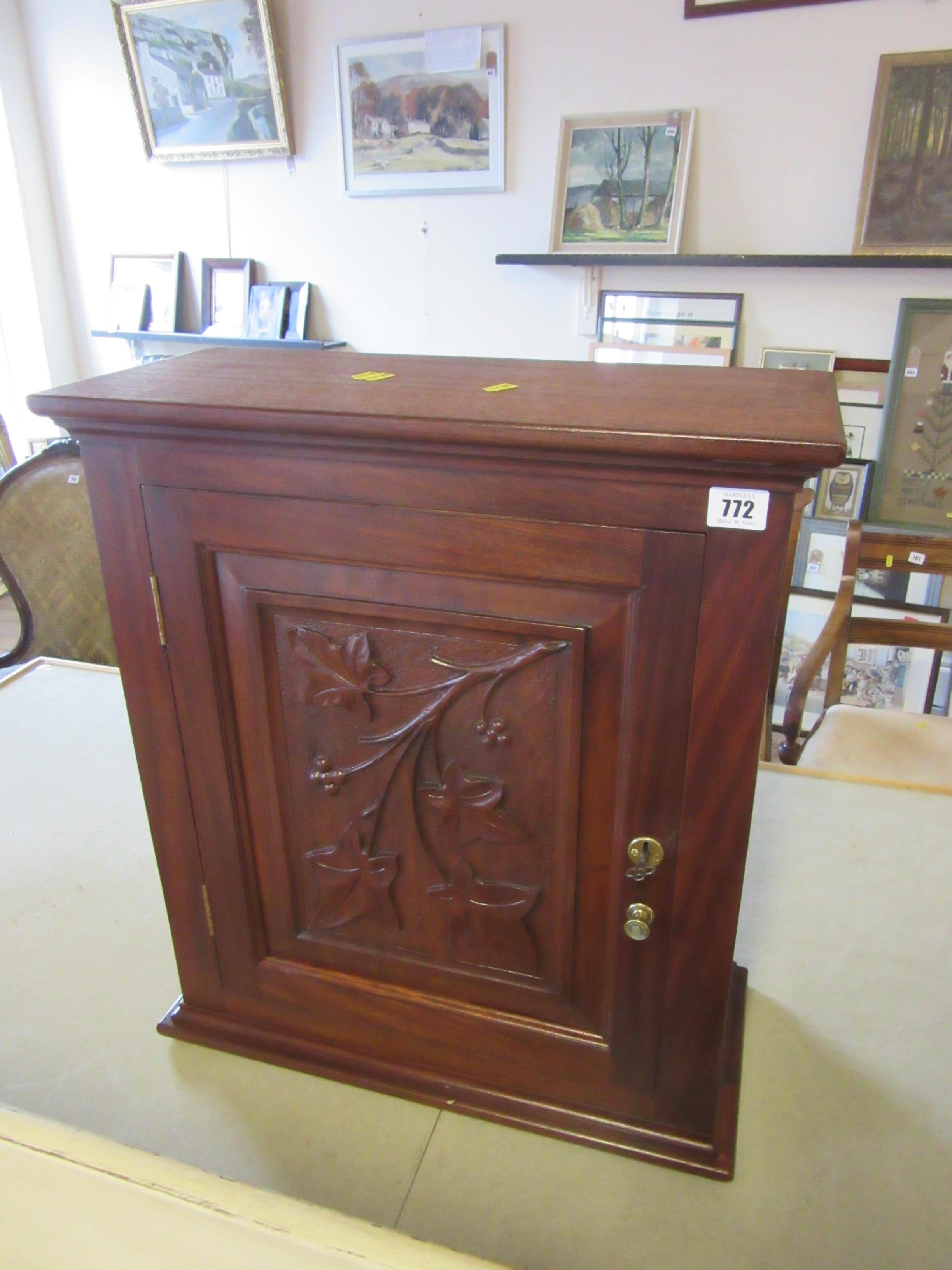 SMALL CUPBOARD WITH PLANT MOTIF AND KEY Image