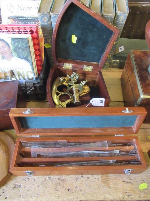 CASED BRASS SEXTANT AND CASED CRISWELL GUIDES Image