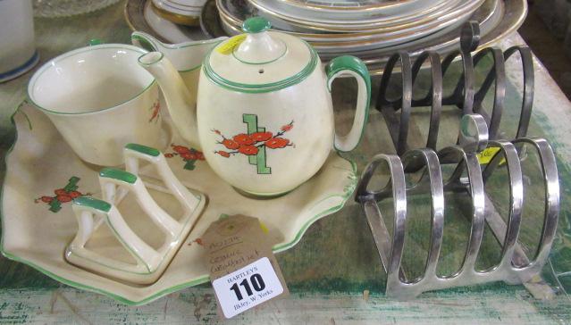 ART DECO POTTERY SOLITAIRE AND TWO EPNS TOAST RACKS Image