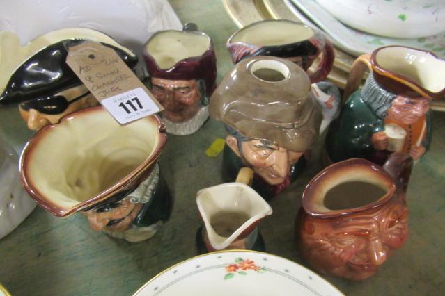 EIGHT SMALL CHARACTER JUGS Image