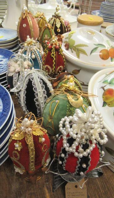 COLLECTION OF DECORATED EGGS ON STANDS Image