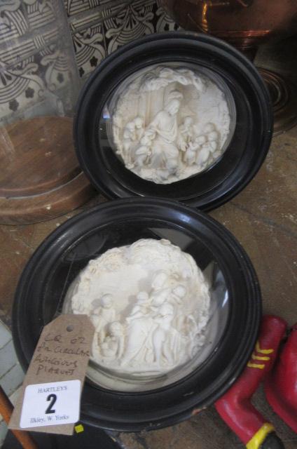 PAIR OF CIRCULAR RELIGIOUS PLAQUES Image