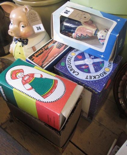 EIGHT TINPLATE TOYS Image