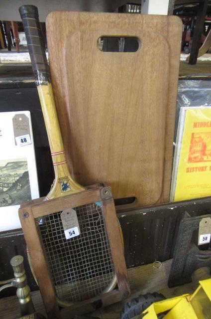 CHOPPING BOARD AND TENNIS RACKET Image