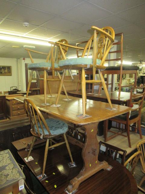 ERCOL TABLE AND SIX ERCOL CHAIRS INCLUDING TWO CARVERS Image
