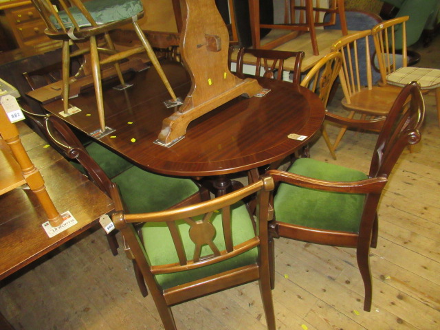 EXTENDING DINING TABLE AND EIGHT CHAIRS Image