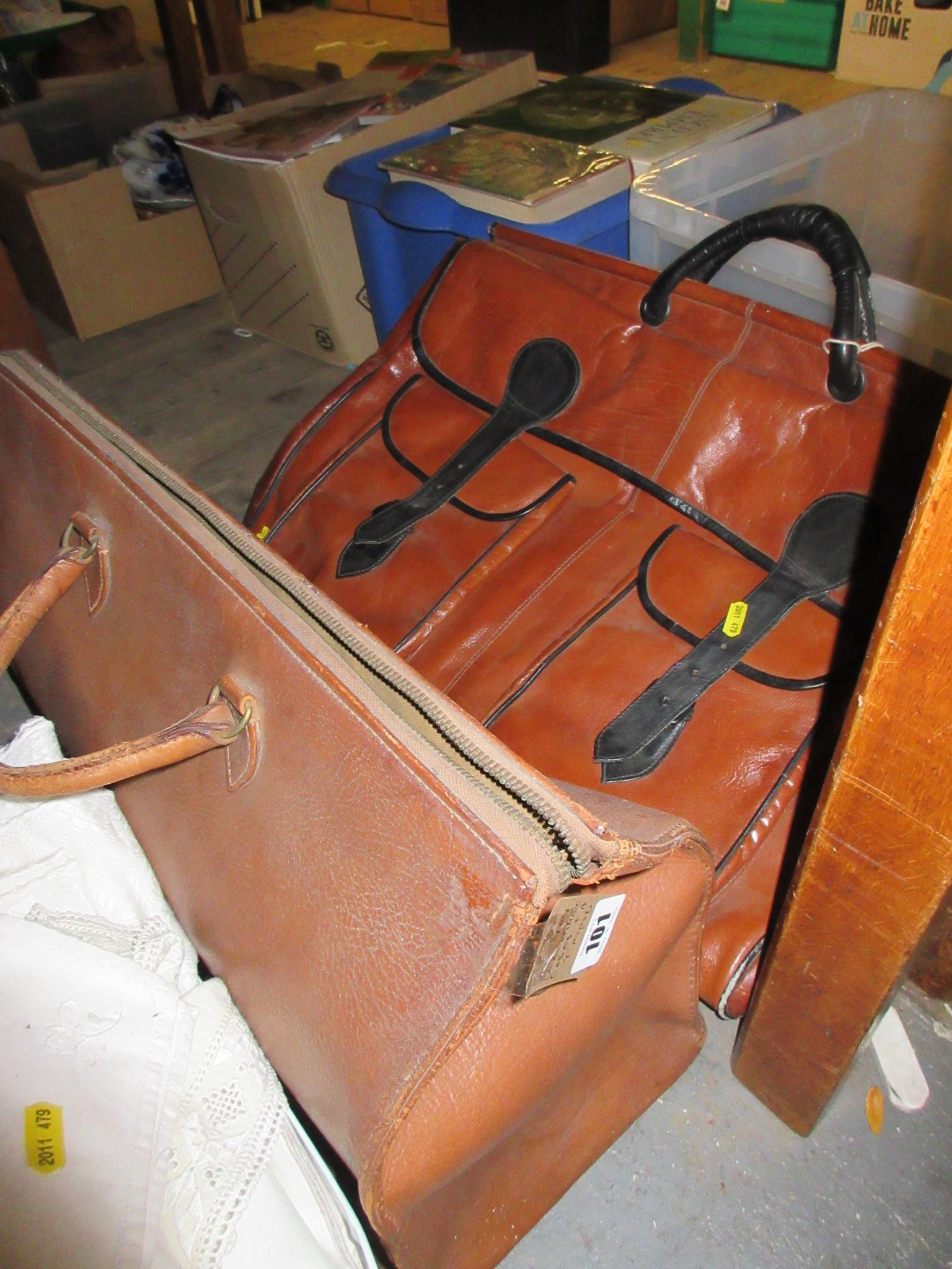 TWO LEATHER CASES AND A TRIPOD Image