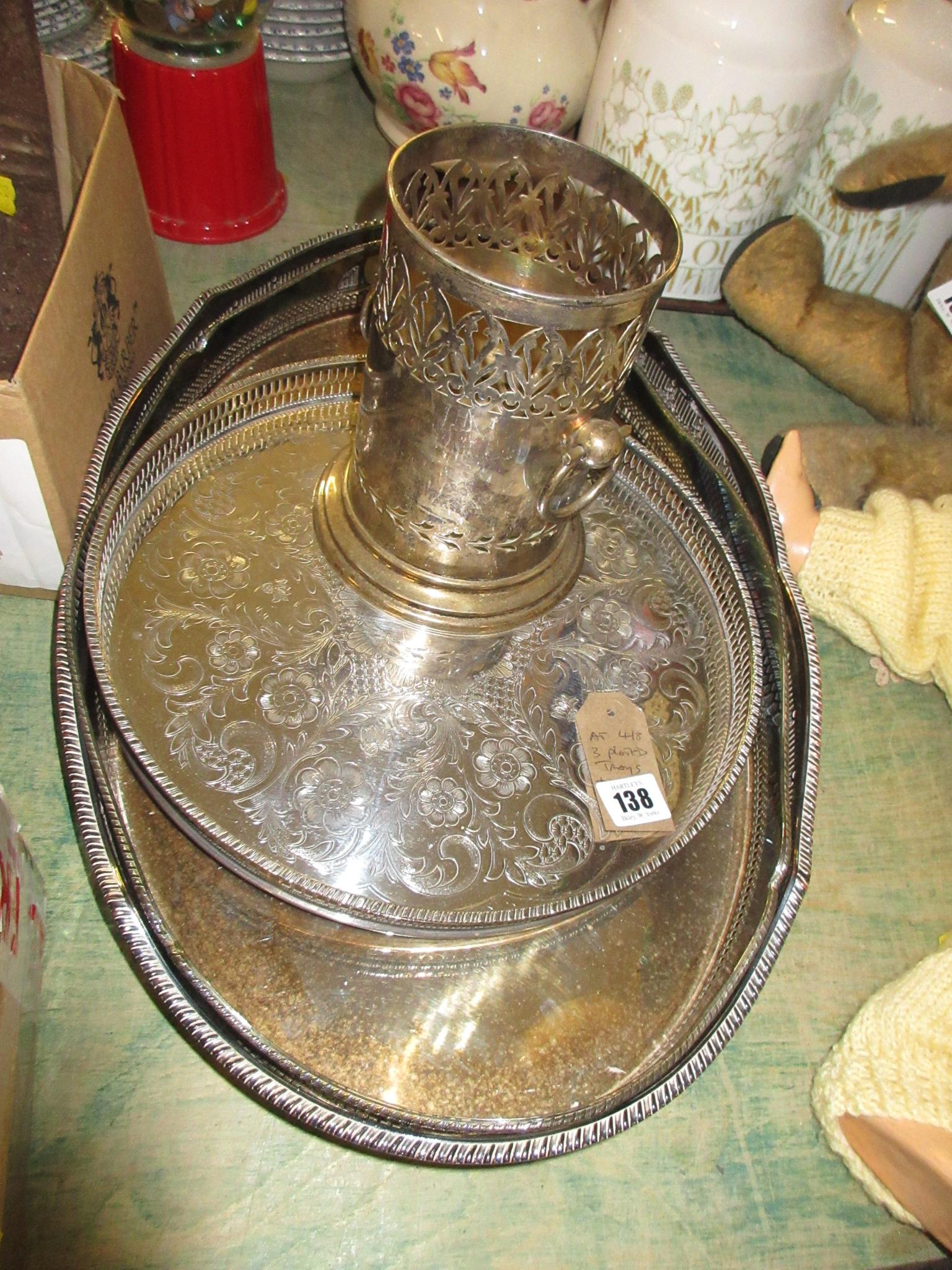 THREE PLATED TRAYS AND A WINE COOLER Image