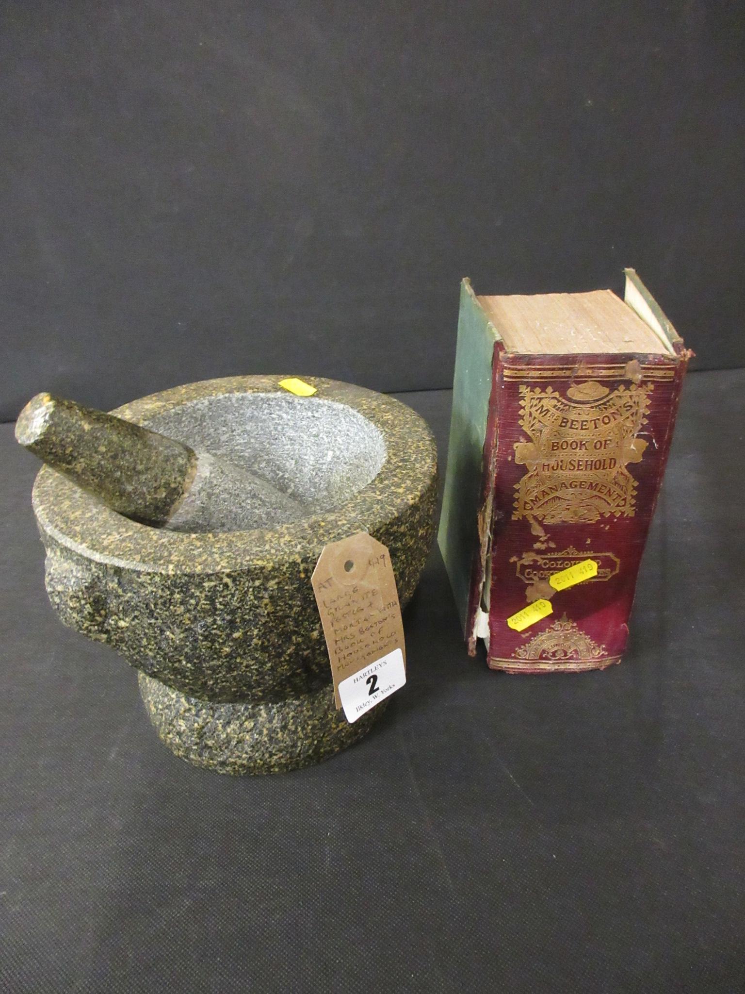 LARGE GRANITE PESTLE AND MORTAR WITH MRS BEETON'S BOOK OF HOUSEHOLD MANAGEMENT Image